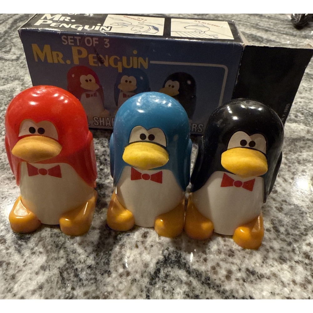 Set Of 3 "Mr. Penguin" pencil sharpeners and erasers 1985